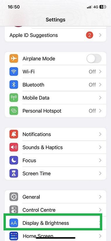 Display & Brightness from the Settings on your screen.
